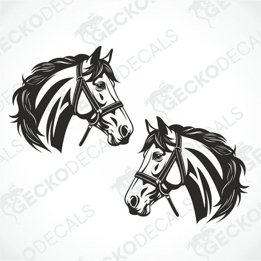 Two black and white decals of horses with transfer paper Gecko Decals branding on them.