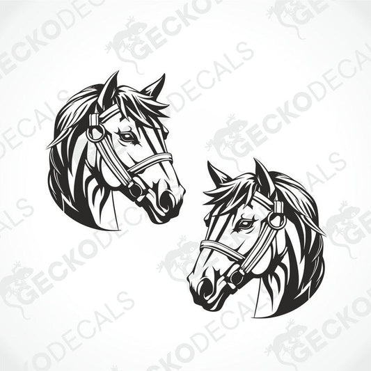 Two black and white decals of horses with transfer paper Gecko Decals branding on them.