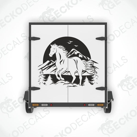 A black die cut decal of a horse with a mountainous background.