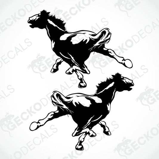 Two black and white horse decals in a running pose, delivered on transfer paper.