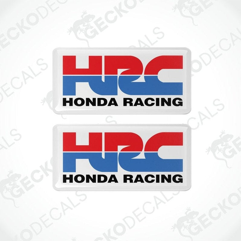 Two square vinyl stickers with a red, blue, and white design featuring the text 'HONDA RACING' and the Honda logo.