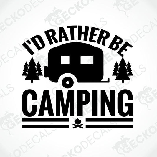Black die-cut camping decal with camper silhouette and pine trees on transfer paper