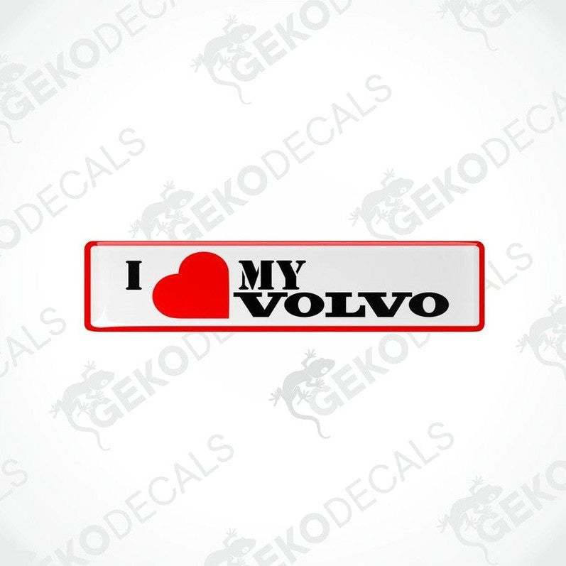 Two red, black, and white vinyl decals with the text 'I heart MY VOLVO' on them, displayed on a white background.