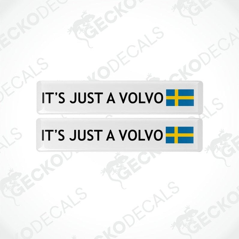 Two rectangular car decals with the text 'IT'S JUST A VOLVO' and the Swedish flag.