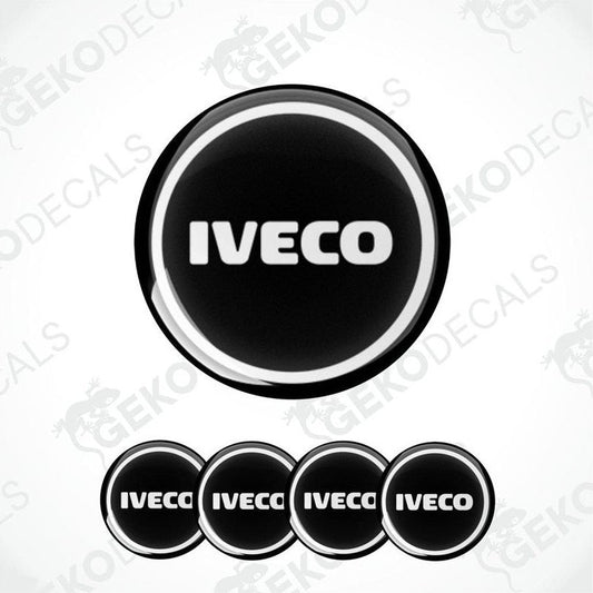 A set of four black vinyl decals with the white IVECO logo on them.