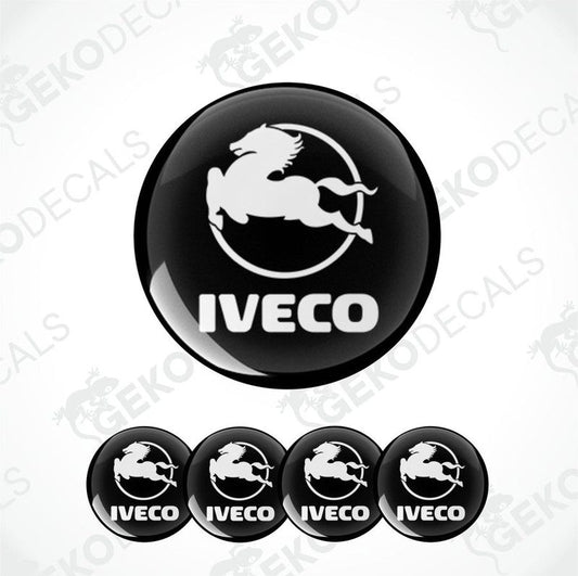 A set of black and white vinyl decals with the IVECO logo, including one large decal and four smaller ones.
