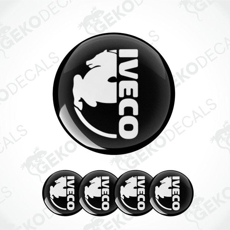 A set of black and white vinyl decals with the IVECO logo, including one large decal and four smaller ones.