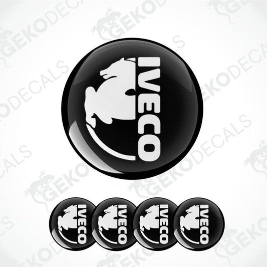 A set of black and white vinyl decals with the IVECO logo, including one large decal and four smaller ones.