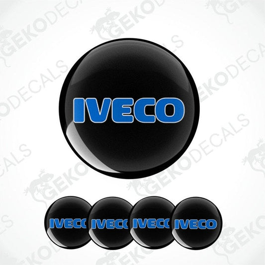 A set of four black vinyl stickers with the word 'IVECO' printed in blue and white.