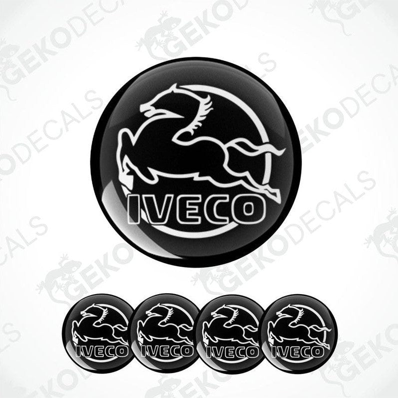A set of black and white vinyl decals with the IVECO logo, including one large decal and four smaller ones.