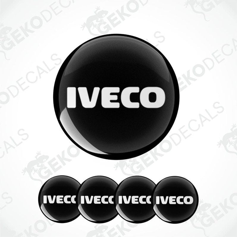 A set of four black vinyl decals with the white IVECO logo on them.