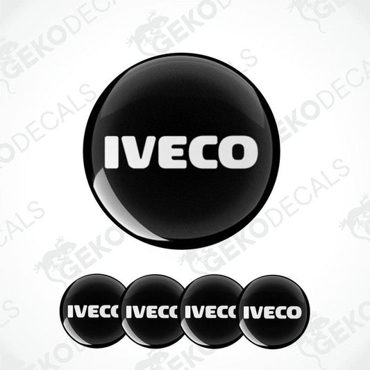 A set of four black vinyl decals with the white IVECO logo on them.