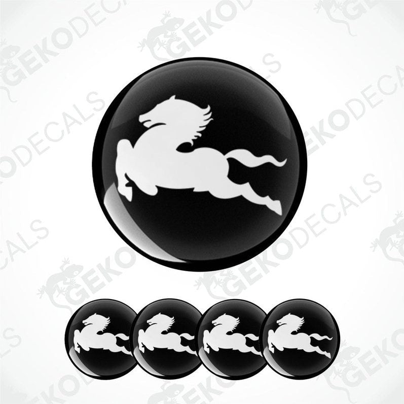 A set of four black vinyl decals with the white IVECO logo on them.