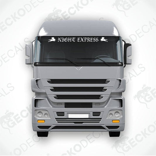 A front view of a truck with a 'NIGHT EXPRESS' decal on its windscreen.