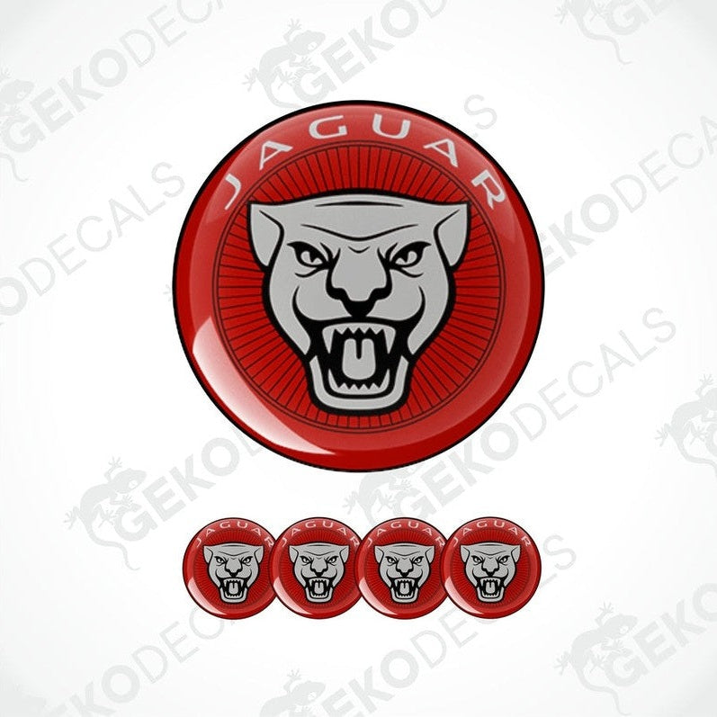 A set of vinyl decals with a polyurethane coating featuring the Jaguar car brand logo in red, black, and white colors.