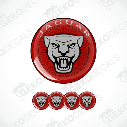 A set of vinyl decals with a polyurethane coating featuring the Jaguar car brand logo in red, black, and white colors.