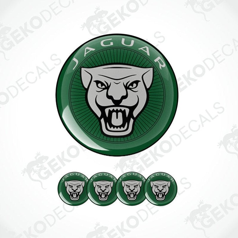 A set of four green vinyl stickers with a Jaguar logo.
