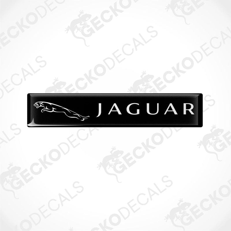 Black rectangular car decals with the word 'JAGUAR' written on them in white lettering, along with the image of a jaguar in white.