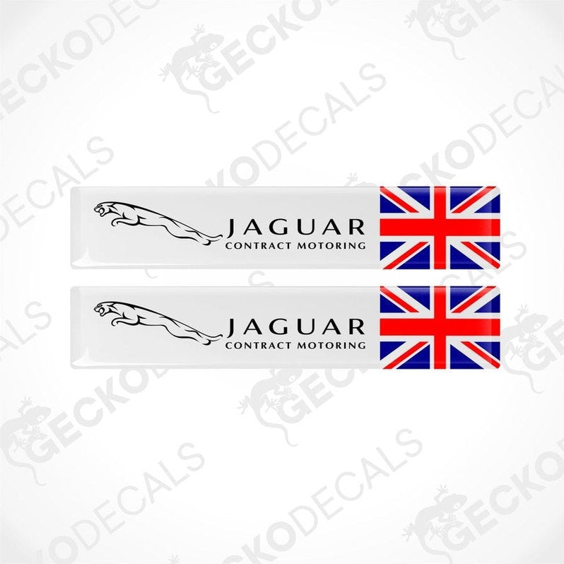 Two white vinyl stickers with the Jaguar logo and a British flag design, placed against a white background.