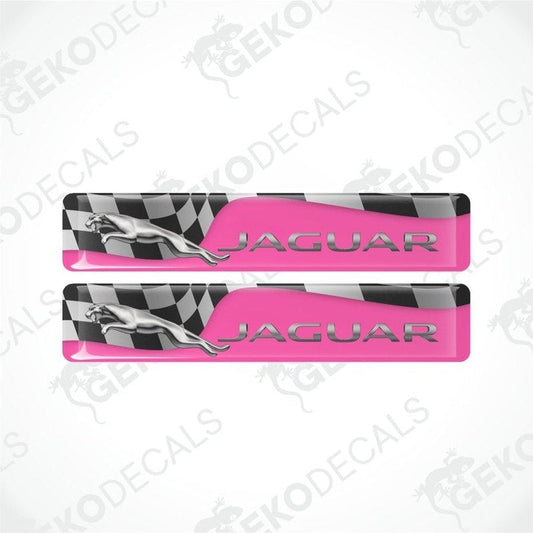 Two Jaguar car door sill protectors with pink and black checkered design on a white background.