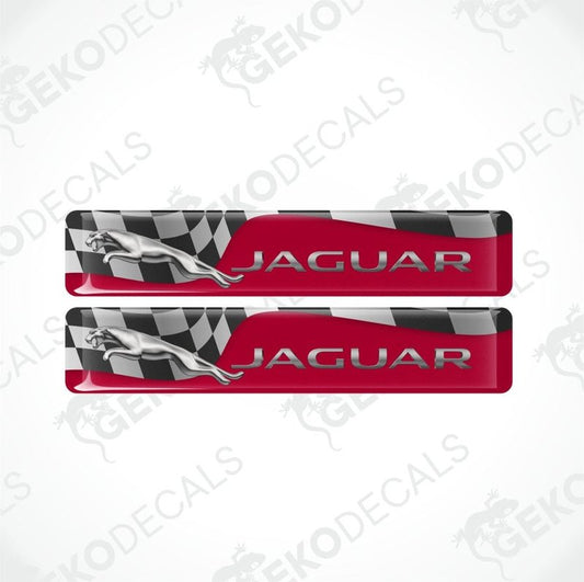 Two Jaguar car door sill protectors with checkered flag design on a white background.