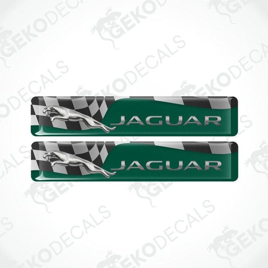 Two Jaguar car decals with a green background and checkered pattern on a white background.