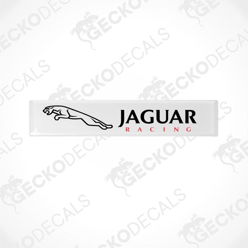  White rectangular car decals with the text 'JAGUAR Racing' on them.