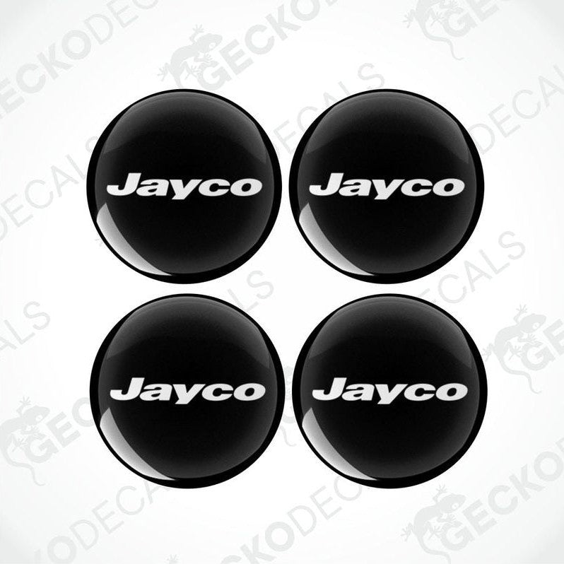 A set of four black vinyl decals with the 'Jayco' brand name on them, designed for use on caravans.
