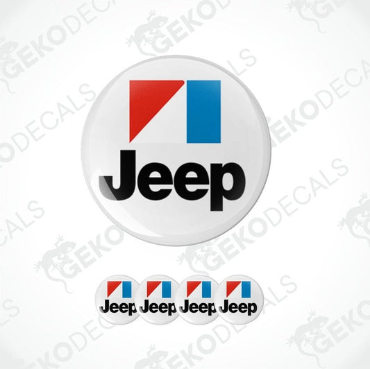 A set of four Jeep branded vinyl decals, three in circular shape and one in rectangular shape, with a red, black, and blue color scheme.