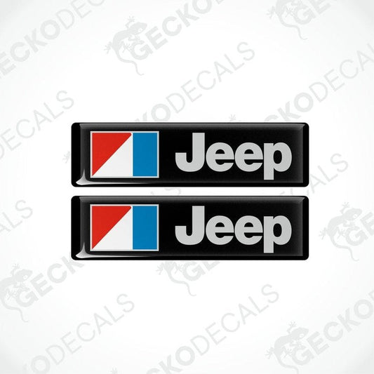 Two rectangular Jeep branded vinyl decals with a red, white, and blue color scheme.