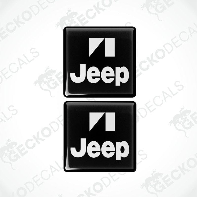 Two black and white square decals with the Jeep logo.