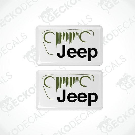 Two white rectangular Jeep brand vinyl decals with green and black detailing.