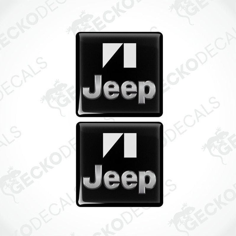 Two black vinyl stickers with the JEEP brand logo on them.