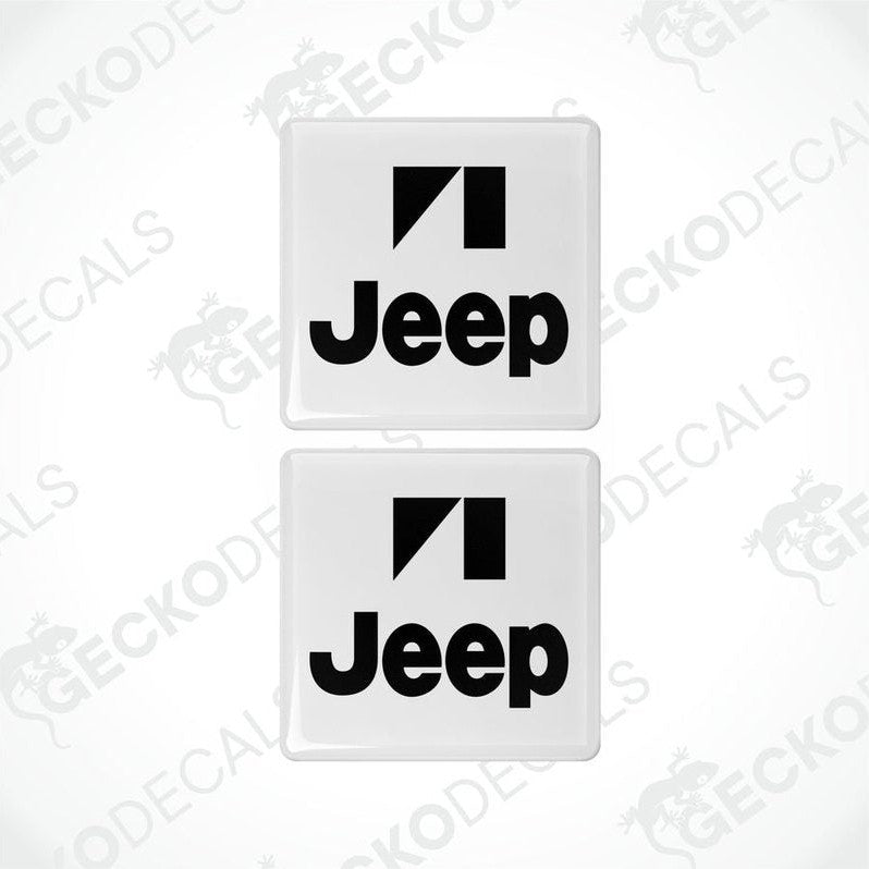 Two withe and black square decals with the Jeep logo.