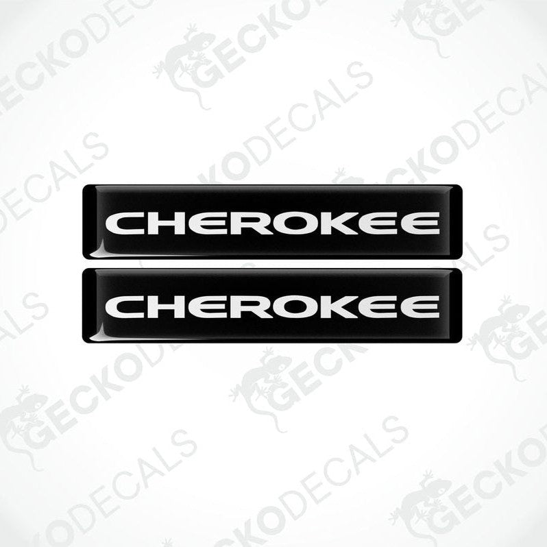 Two black vinyl decals with the word 'CHEROKEE' written in white letters.