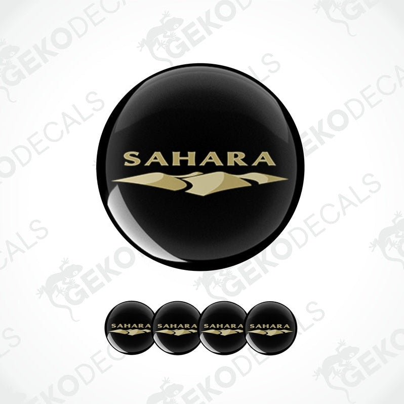 A set of black vinyl decals with 'SAHARA' written in gold lettering, displayed on a white background.