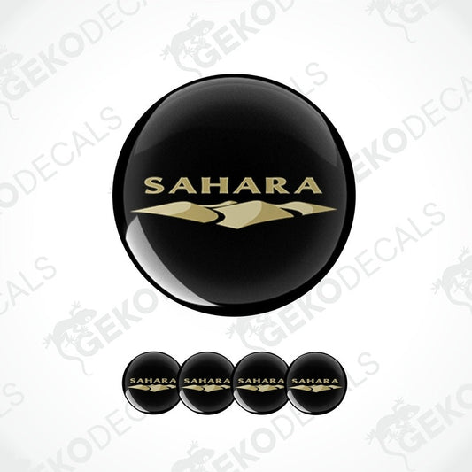 A set of black vinyl decals with 'SAHARA' written in gold lettering, displayed on a white background.