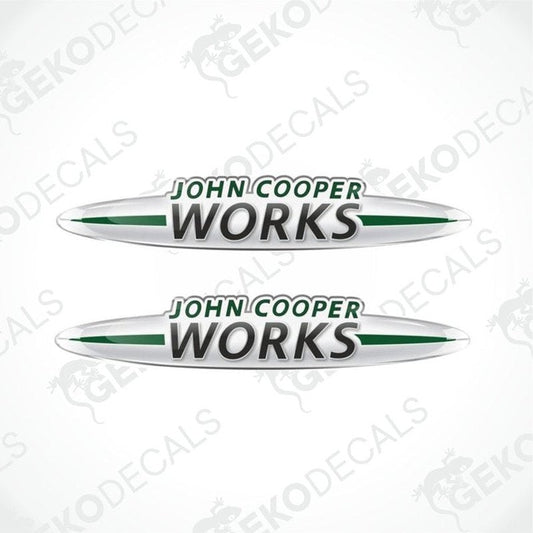 Two vinyl decals with 'John Cooper Works' text, predominantly white with green accents and a silver outline.