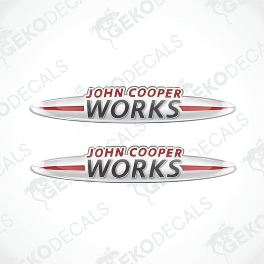 Two vinyl decals with 'John Cooper Works' text, predominantly red and silver in color, designed for vehicle use.
