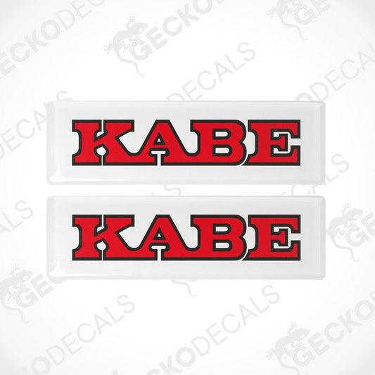 Two red and white car decals with the word 'KABE' printed in bold letters.