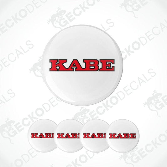 Set of white coasters with 'KABE' printed in red on a white background.