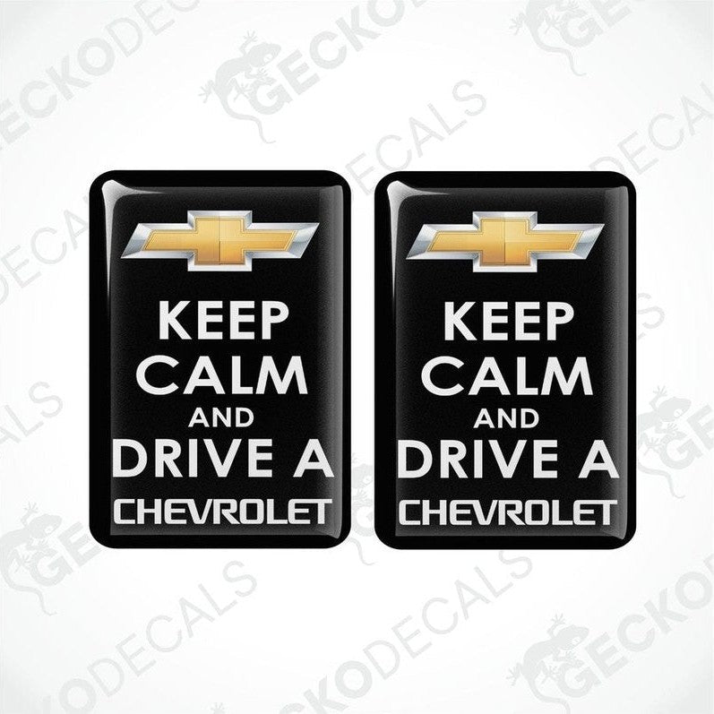 Two black vinyl stickers with the text 'KEEP CALM AND DRIVE A CHEVROLET' and the Chevrolet logo.