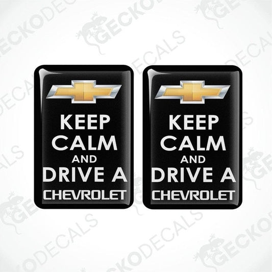 Two black vinyl stickers with the text 'KEEP CALM AND DRIVE A CHEVROLET' and the Chevrolet logo.