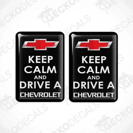 Two black vinyl stickers with the text 'KEEP CALM AND DRIVE A CHEVROLET' and the Chevrolet logo.