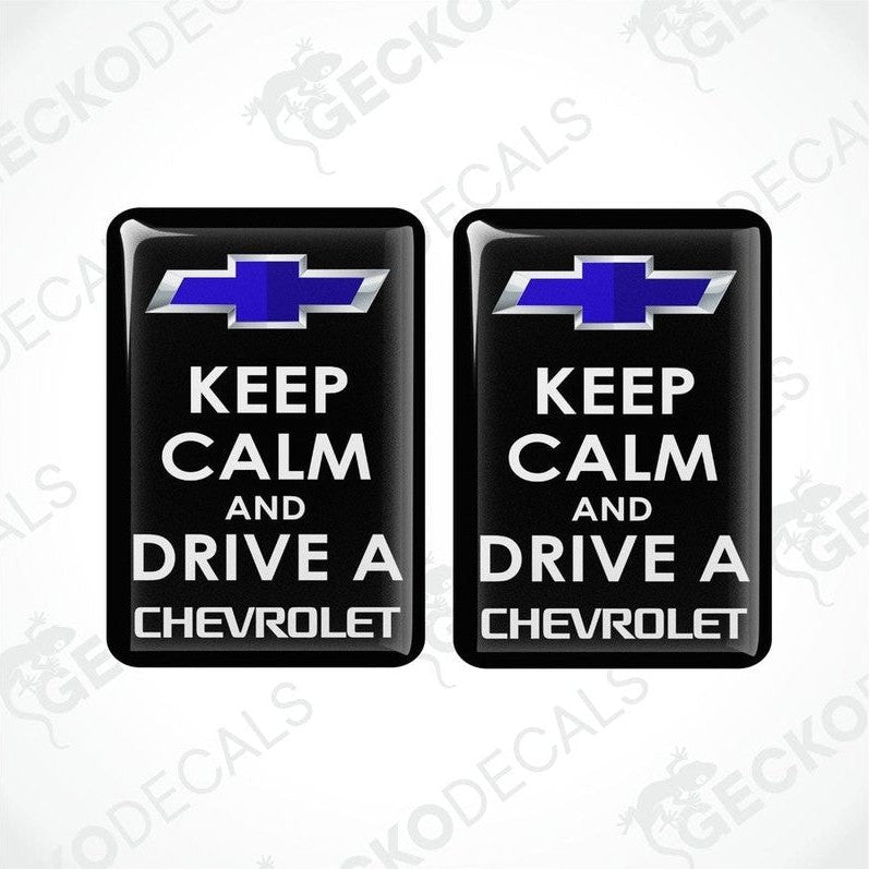Two black vinyl stickers with the text 'KEEP CALM AND DRIVE A CHEVROLET' and the Chevrolet logo.