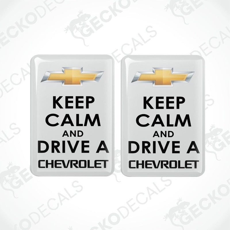 Two white vinyl stickers with the text 'KEEP CALM AND DRIVE A CHEVROLET' and the Chevrolet logo.