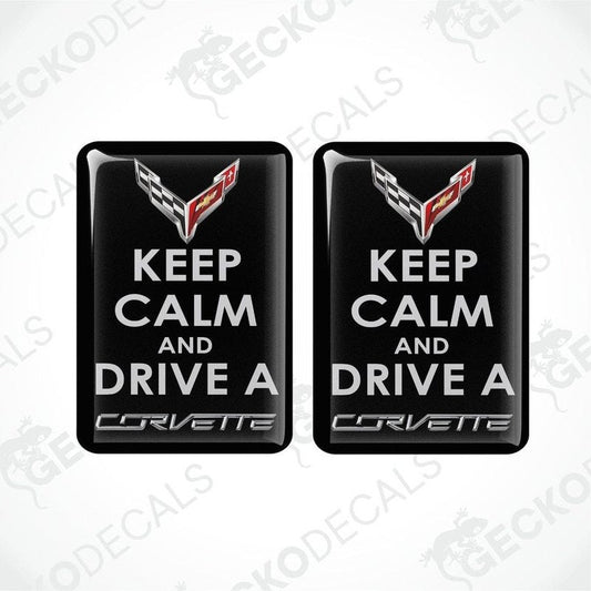 Two black vinyl stickers with the text 'KEEP CALM AND DRIVE A CORVETTE' and the Chevrolet Corvette logo.
