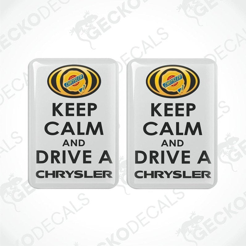 Two white vinyl stickers with the text 'KEEP CALM AND DRIVE A CHRYSLER' and the Chrysler brand logo.