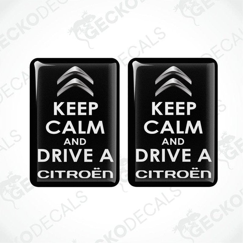 Two black vinyl stickers with the text 'KEEP CALM AND DRIVE A CITROEN' and the Citroën logo.