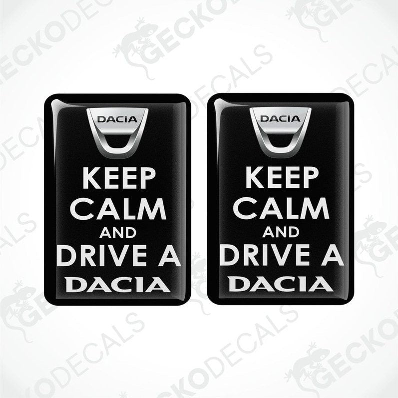 Two black vinyl decals with white text saying 'KEEP CALM AND DRIVE A DACIA'